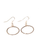 Sterling silver thin twist wire loop earrings. Handmade by Navajo artisan Nashina Tsosie
