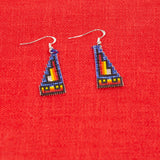 flat side pyramid earrings by Navajo artisan Denise and or Deandra Goldtooth.