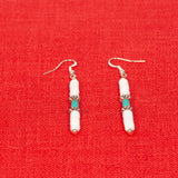 White clam shell and a magnasite tube earring with bead along with silver plated beads